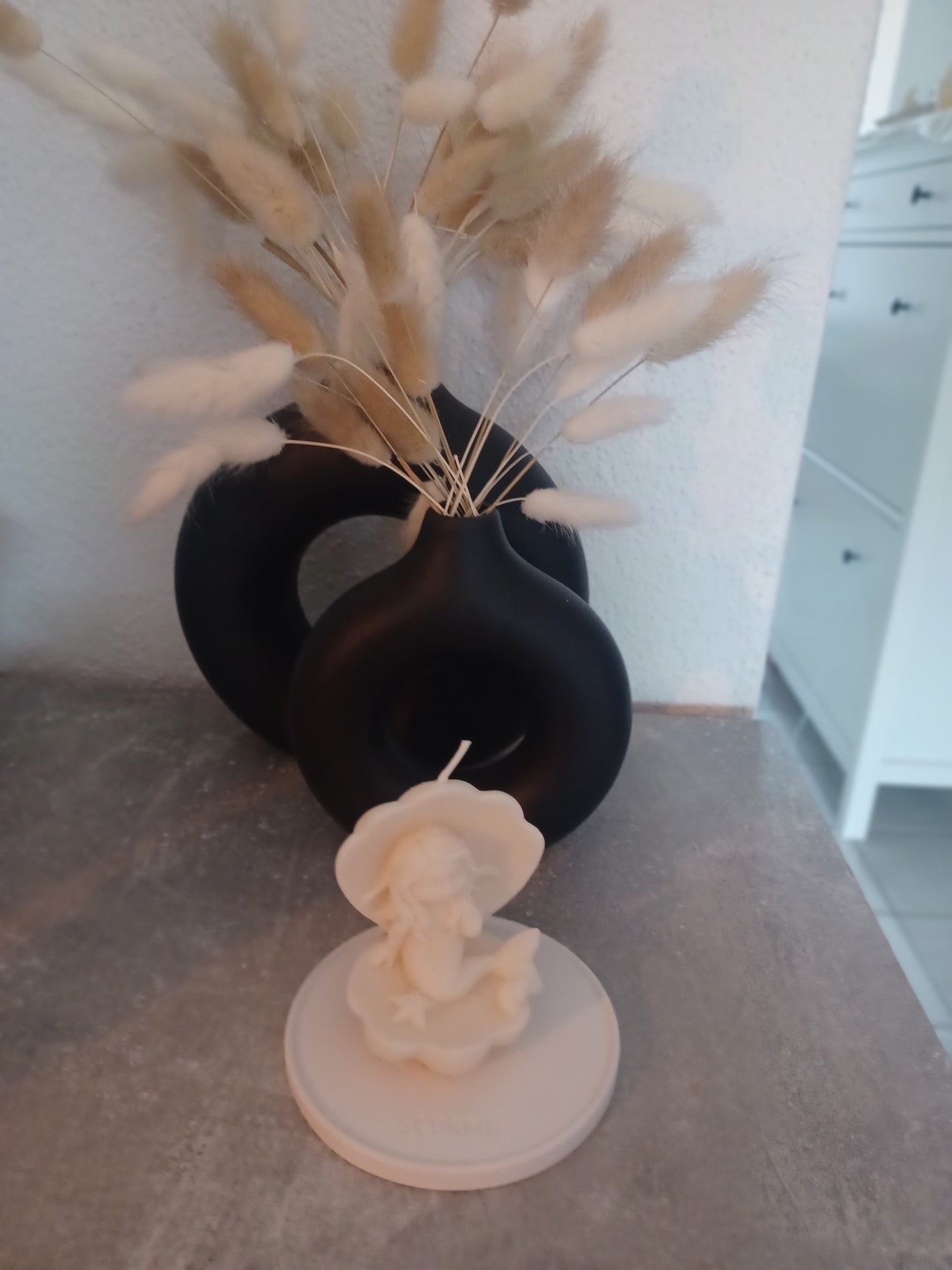 Kleine Meerjungfrau in Muschel